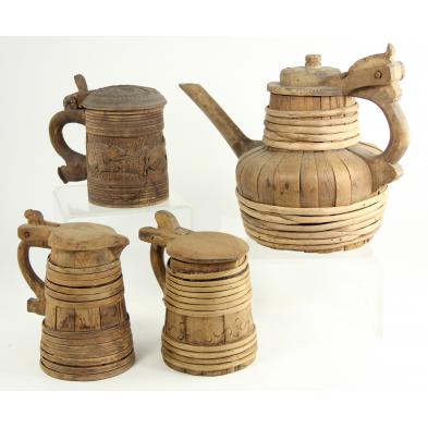 three-continental-wooden-pitchers-one-wooden-stein