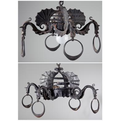 two-spanish-cast-iron-hanging-light-fixtures