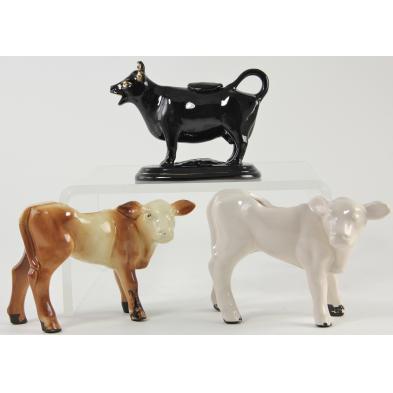three-cow-figures