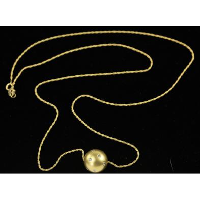 gold-and-diamond-pendant-and-chain