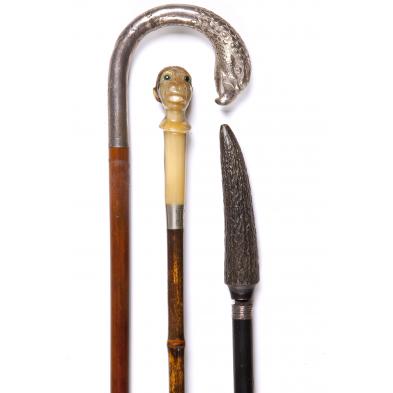 three-antique-continental-walking-sticks