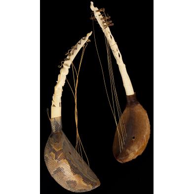pair-of-african-ivory-neck-musical-instruments