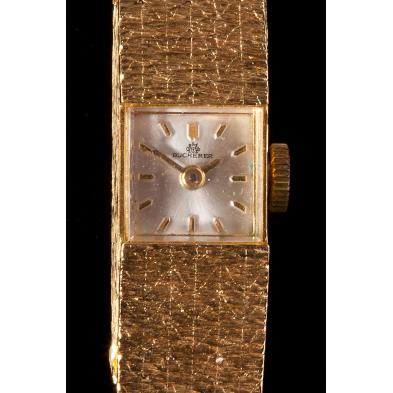 lady-s-gold-wristwatch-pin-carl-bucherer