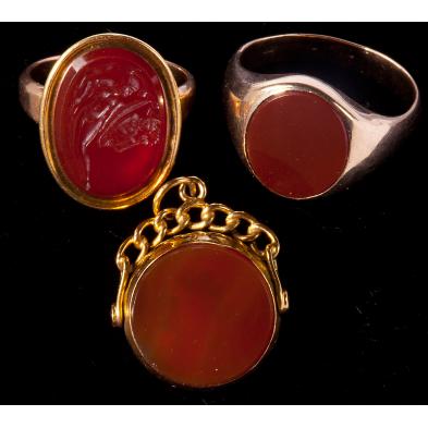 three-gold-and-carnelian-jewelry-items