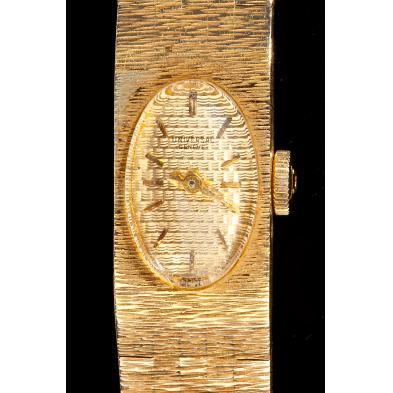 18kt-lady-s-gold-wristwatch-universal-geneve