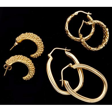 three-pairs-of-gold-hoop-earrings