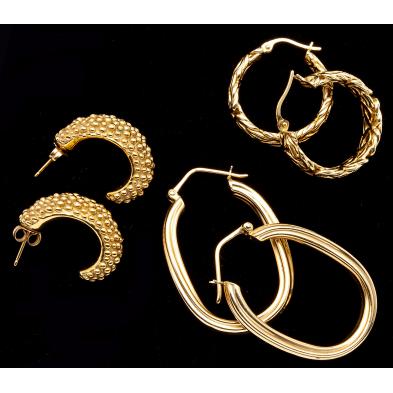 three-pairs-of-gold-hoop-earrings
