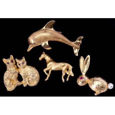 group-of-gold-and-gem-set-animal-brooches