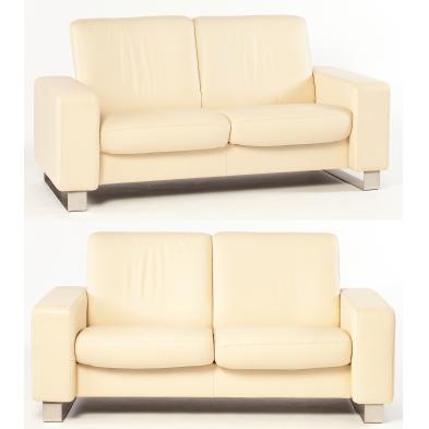 pair-of-j-e-ekornes-leather-love-seats