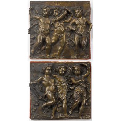 pair-of-mounted-bronze-putti-wall-plaques