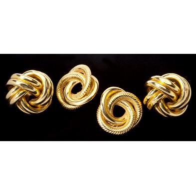 two-pairs-of-gold-earrings