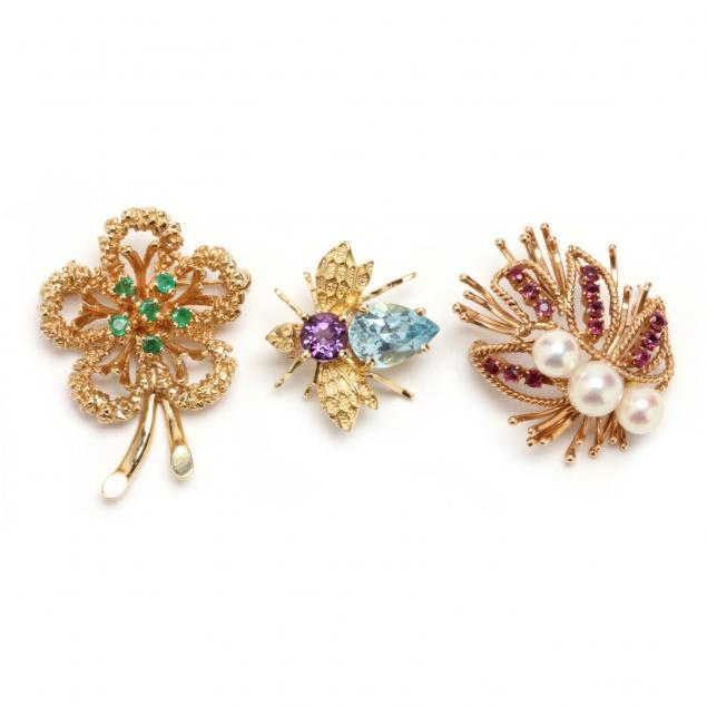 three-14kt-gold-and-gem-set-brooches
