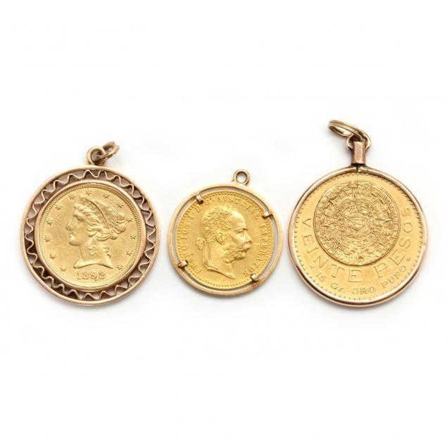 three-gold-coins-mounted-in-gold-suspension-loops