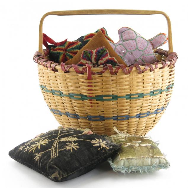 basket-full-of-vintage-pin-cushions