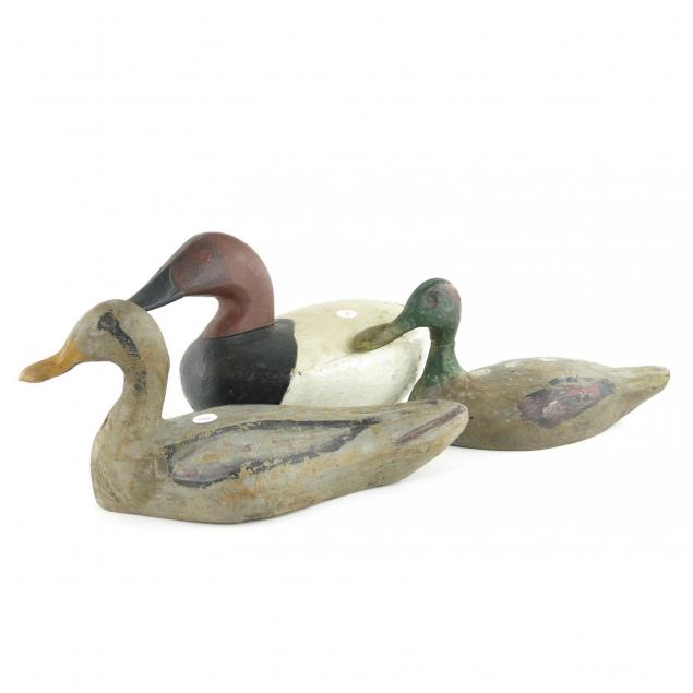 three-carved-and-painted-wood-decoys