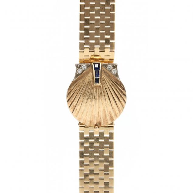 retro-gold-and-gem-shell-form-bracelet-watch-j-schulz