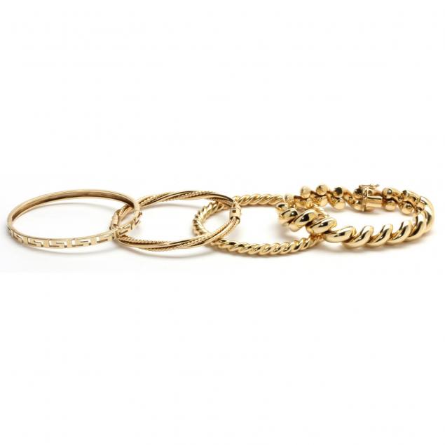 four-14kt-yellow-gold-bracelets