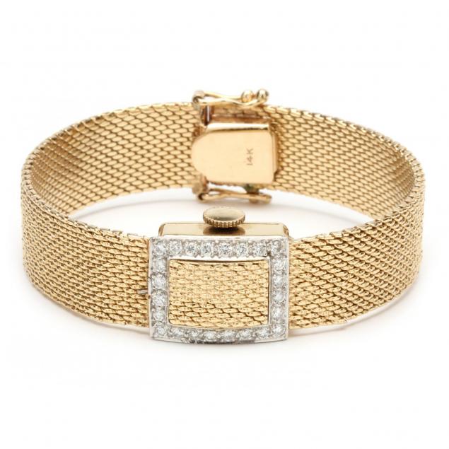 lady-s-14kt-gold-and-diamond-flip-top-bracelet-watch-geneve