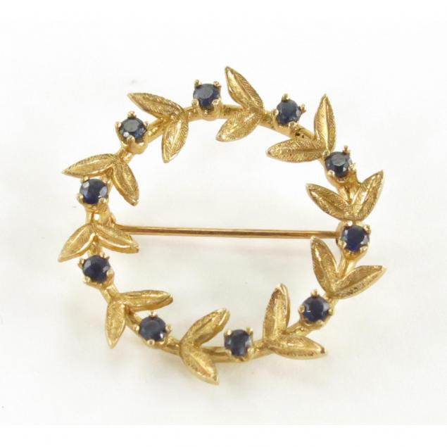 14kt-gold-and-sapphire-circle-brooch