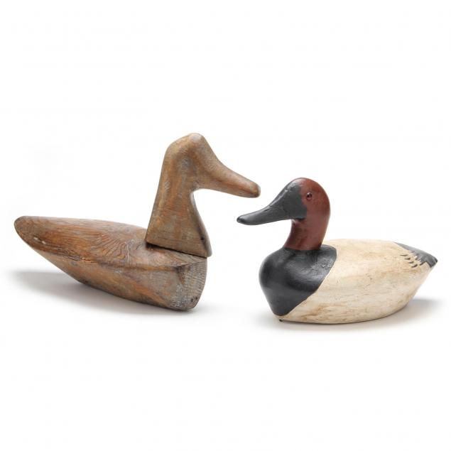two-carved-wooden-decoys