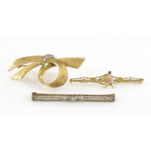 three-vintage-gold-brooches