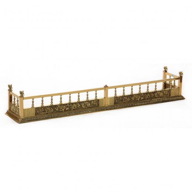 gilt-brass-fire-fender-with-dog-head-finials