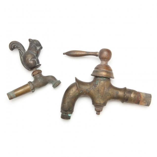 two-antique-brass-faucets-one-figural