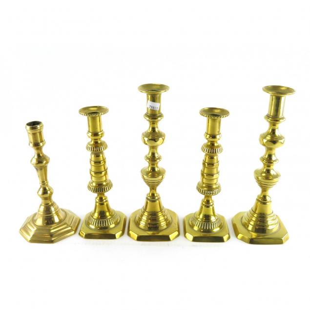 five-antique-brass-candlesticks