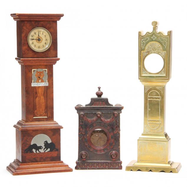 three-antique-vintage-clock-models