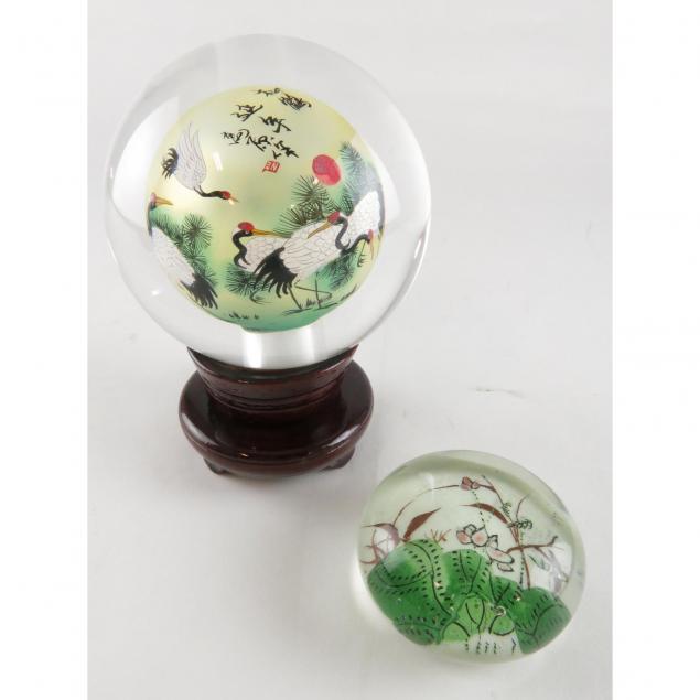 two-asian-paperweights