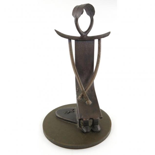 modernist-metal-sculpture-of-a-seated-figure
