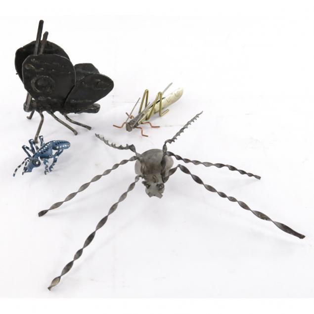 four-metal-figures-of-insects