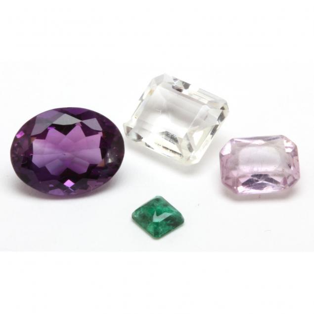 four-unmounted-gemstones