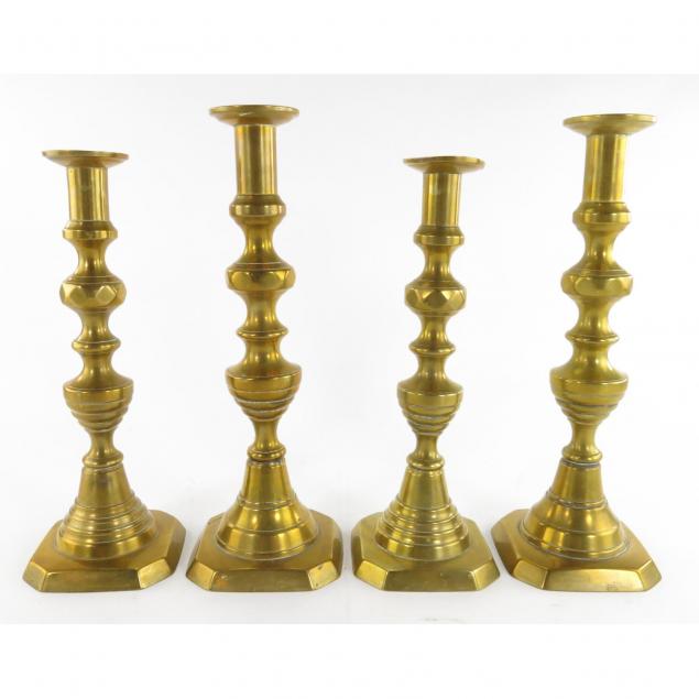 four-brass-candlesticks