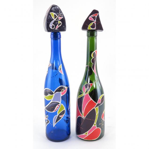 two-artist-painted-wine-bottles-and-stoppers