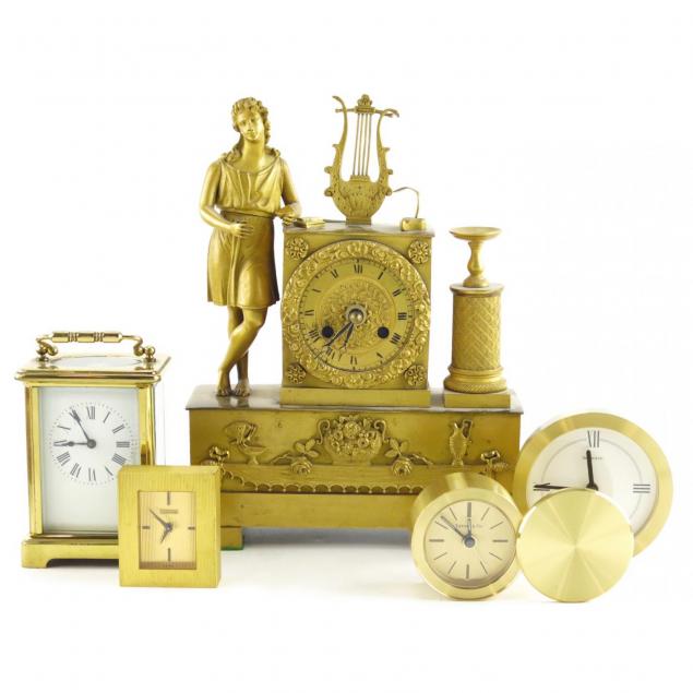 five-brass-clocks