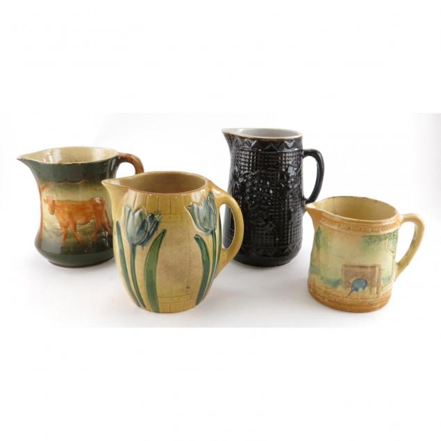 four-stoneware-pitchers