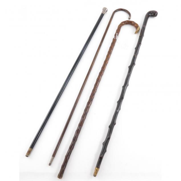 four-vintage-walking-sticks