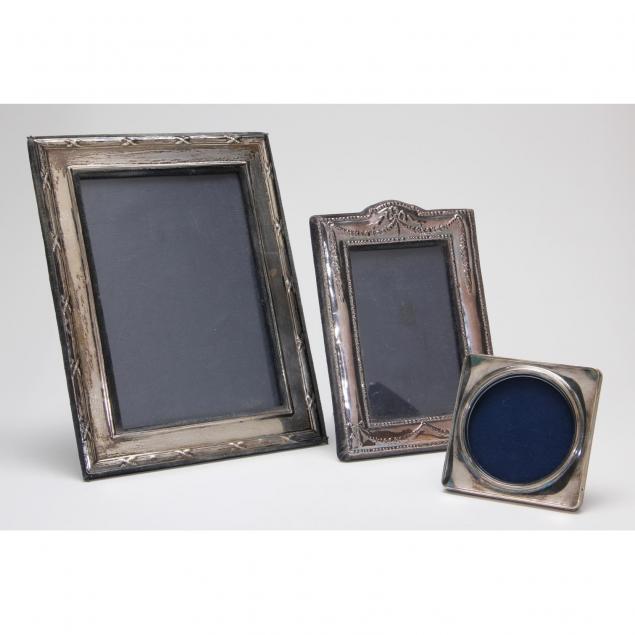 three-silver-frames