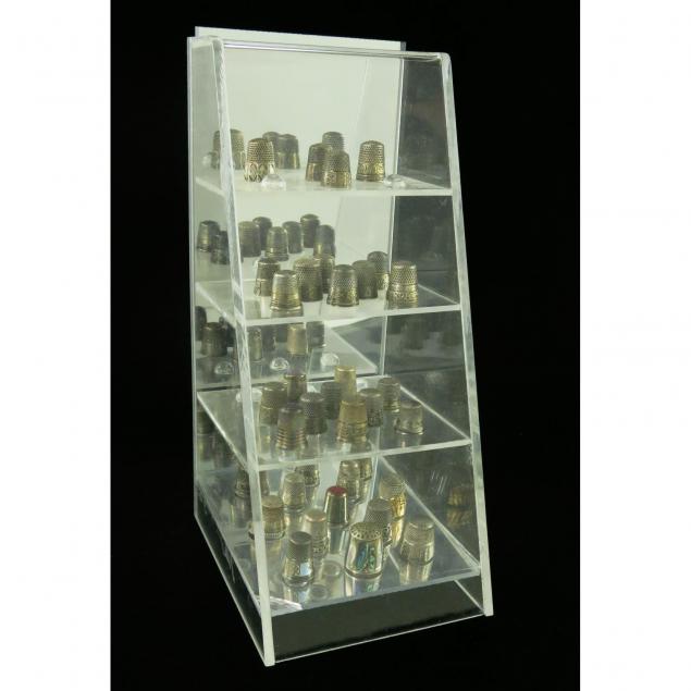 thirty-four-american-sterling-silver-thimbles-with-display-case