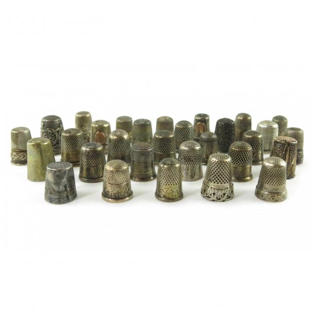 thirty-silver-thimbles