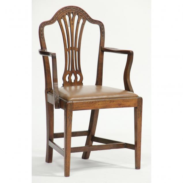 carved-mahogany-arm-chair
