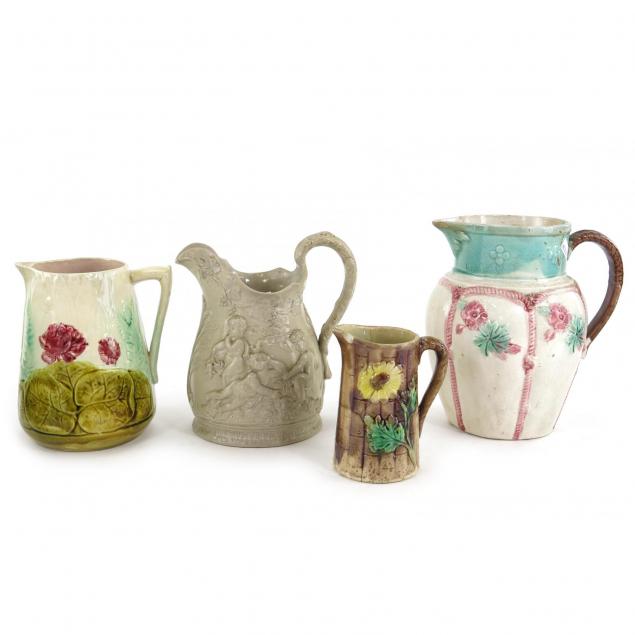 four-antique-pitchers