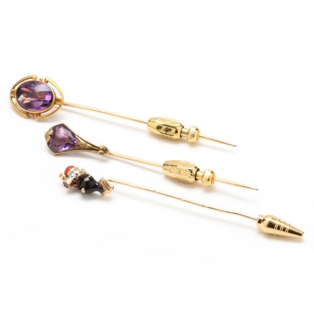 a-blackamoor-and-two-amethyst-stick-pins