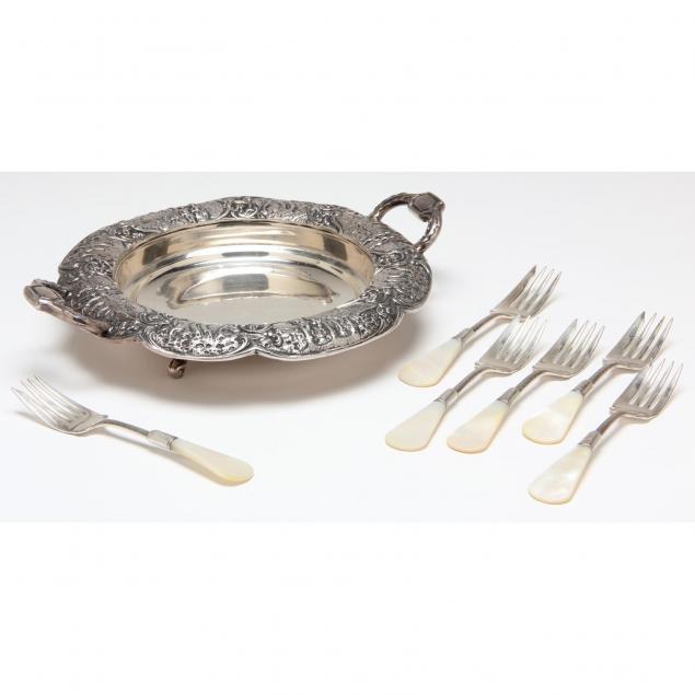 a-set-of-six-mother-of-pearl-handled-silverplate-salad-forks-and-a-dutch-repousse-style-fruit-bowl