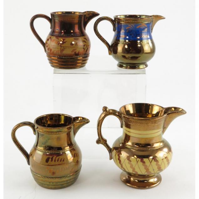 four-lustreware-cream-jugs