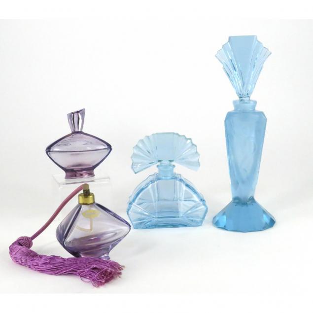 four-glass-perfume-bottles