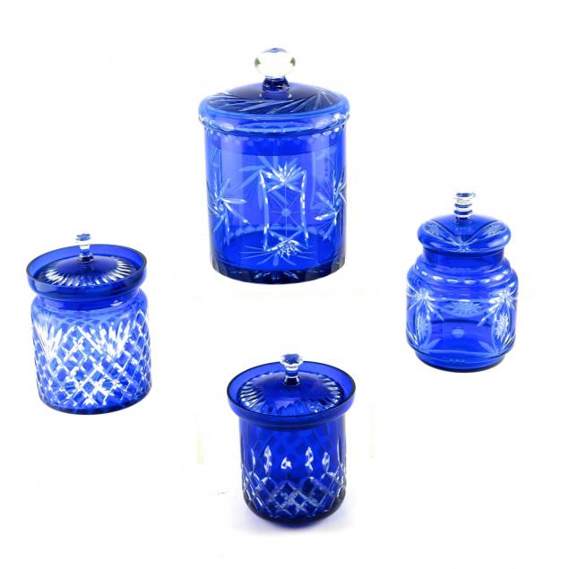 four-cobalt-cut-to-clear-crystal-lidded-canisters