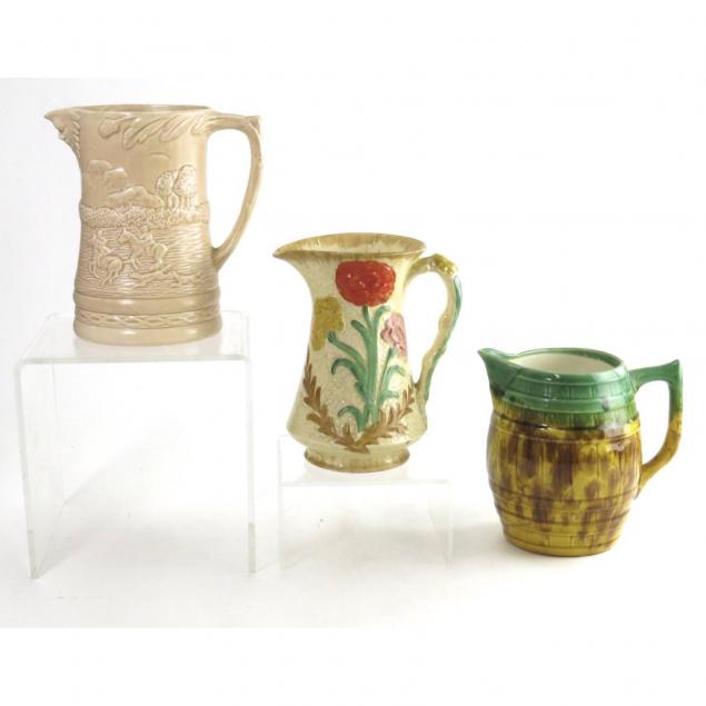 three-antique-english-pitchers