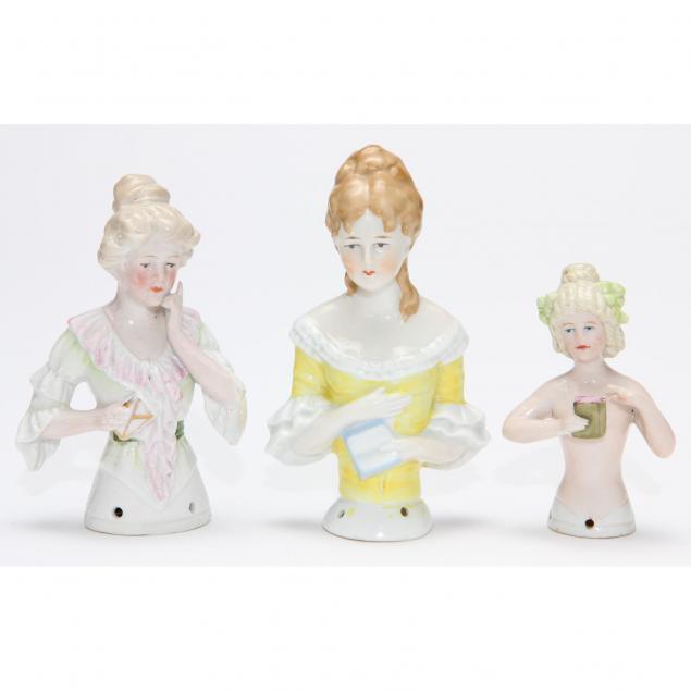 three-german-porcelain-half-dolls-holding-books